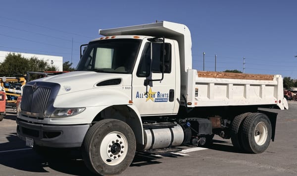 Dump truck delivering material