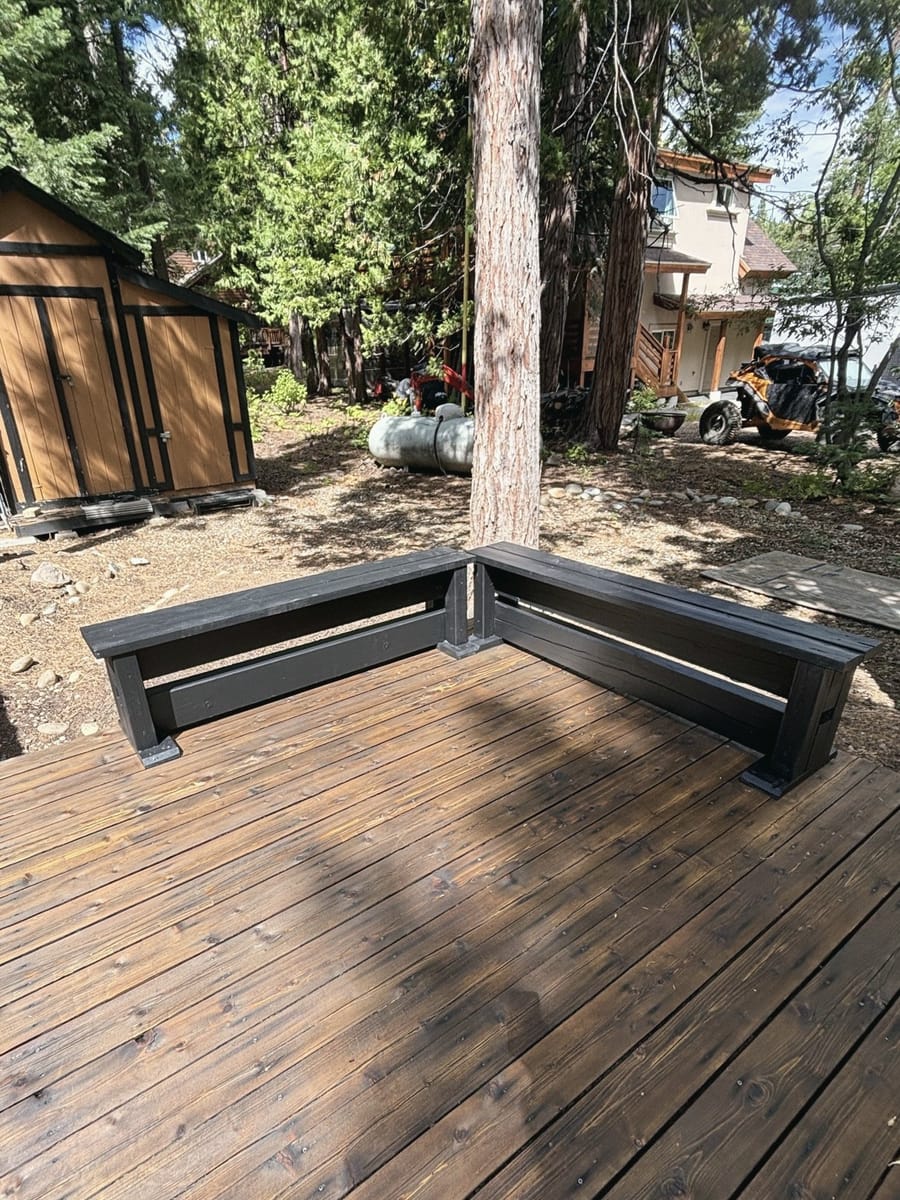Corner bench built on a stained deck