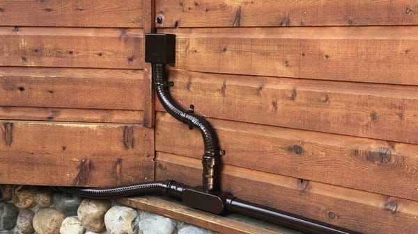 Conduit entering a junction box on a cabin wall
