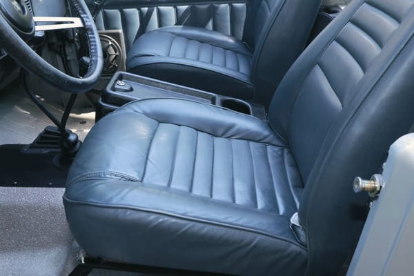 Blue leather seats in a detailed Jeep
